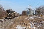 As the conductor starts the air test, another loaded grain train for the Andersons waits to go south